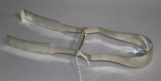 A pair of George III Irish silver asparagus servers, John Dalrymple, Dublin, 1794, 23.4cm.